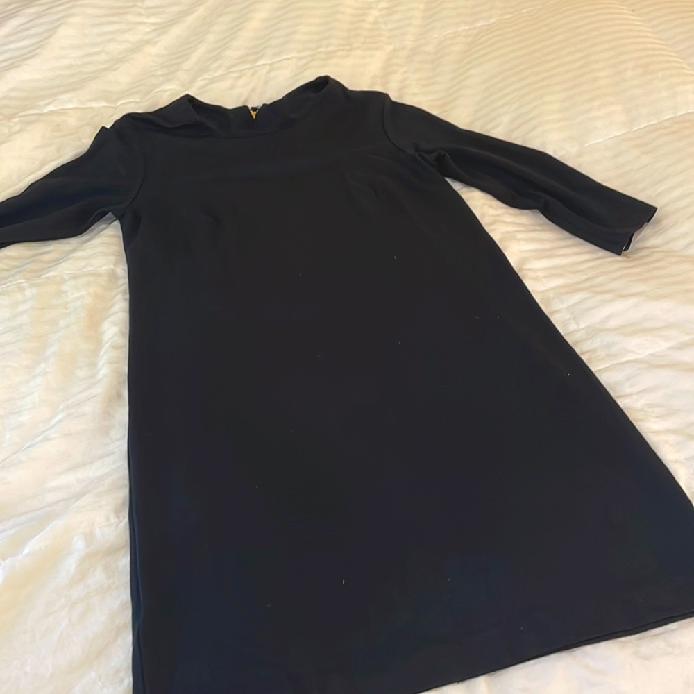 It’s Ann Tyalor Black dress! In a size 12!